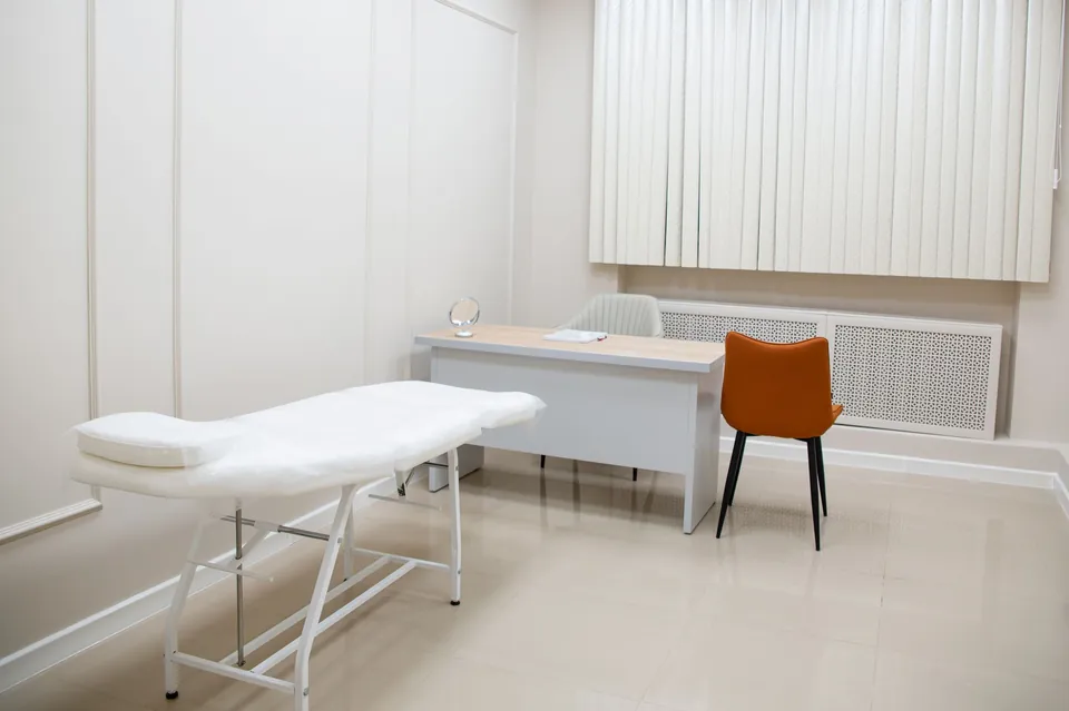 Bright, minimalist consulting room (illustrative photo)